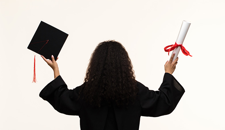 Girl in graduation cap and gown