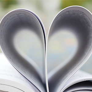 book with pages folded into heart<br />
